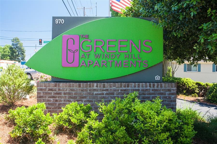 the greens at windy hill sign